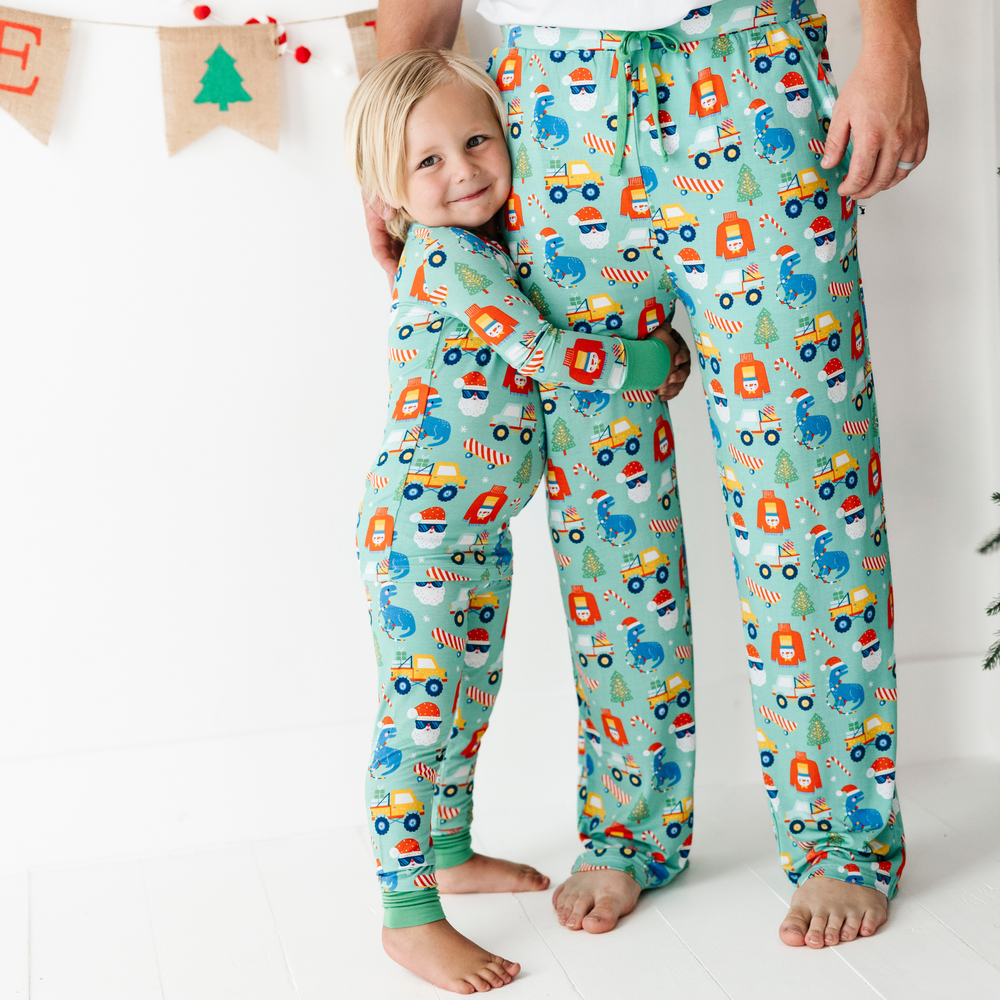 
                      
                        Toddler in Blue Christmas pajamas by Kiki and Lulu
                      
                    