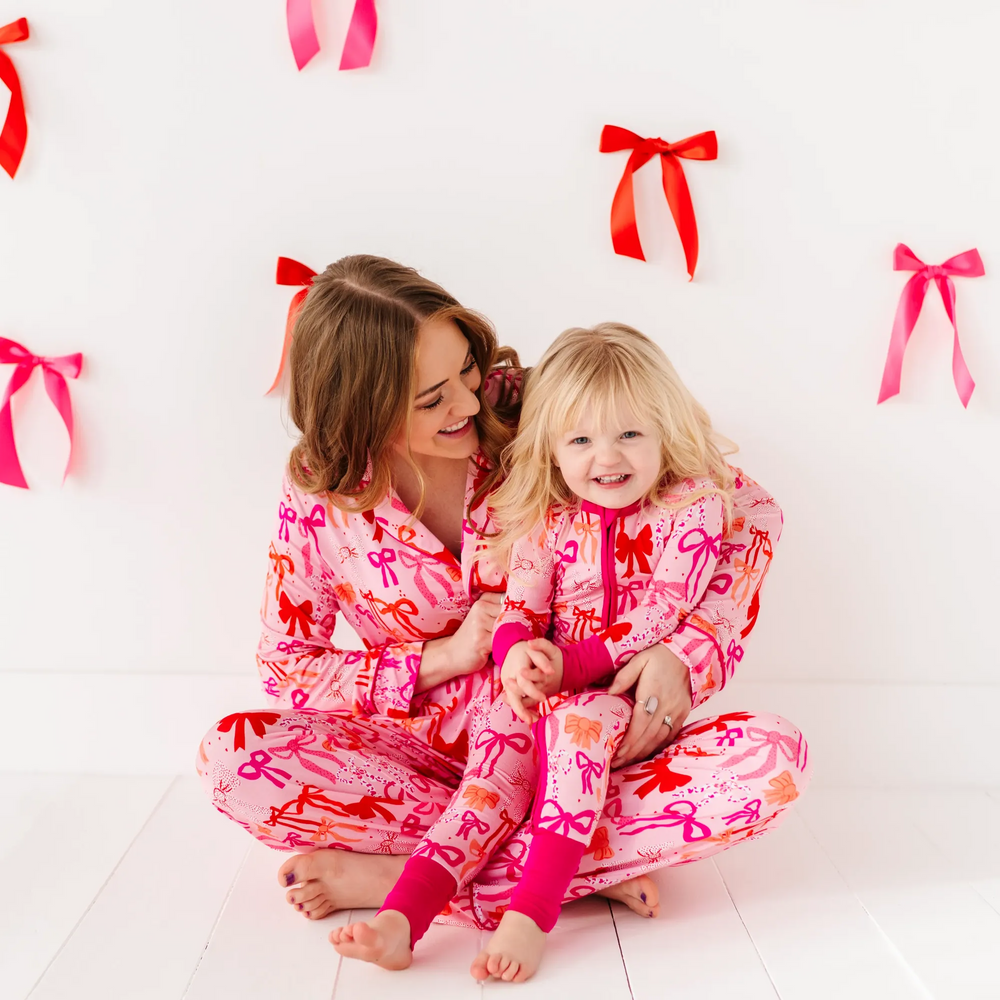 
                      
                        Little Bow Sleep Convertible Footies
                      
                    