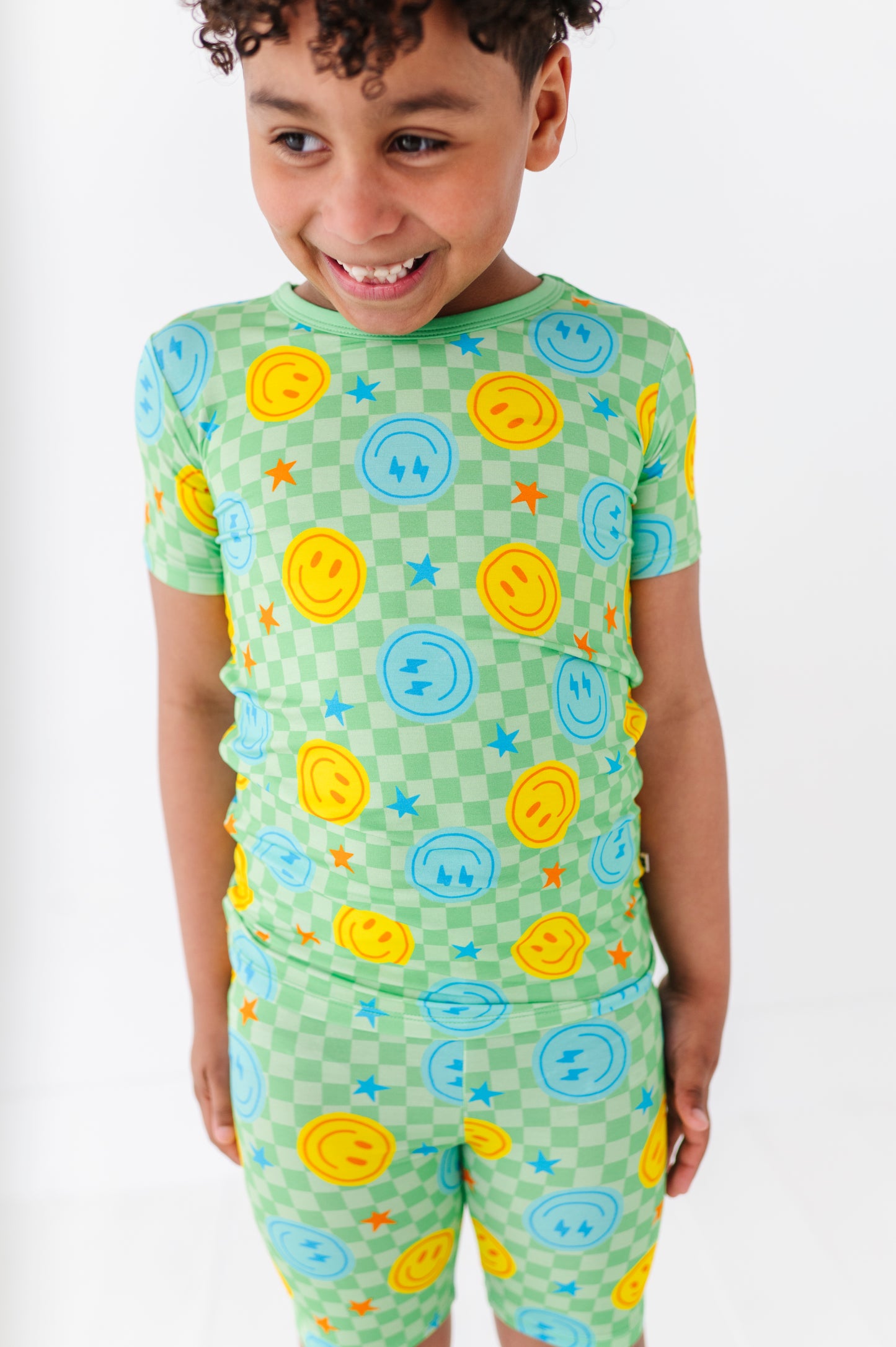 Boy Wearing Short Smiley Pajamas