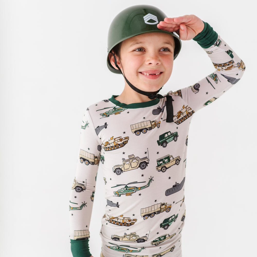 
                      
                        Boy in Military Vehicle Pajamas
                      
                    