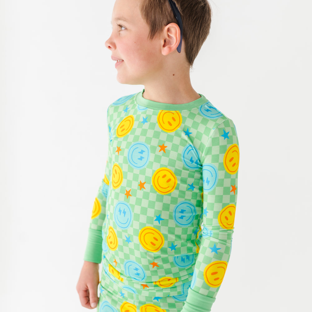 
                      
                        Boy wearing smiley pajamas
                      
                    