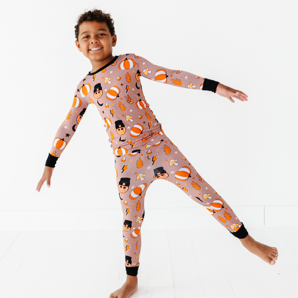 
                      
                        Boy wearing retro pumpkin pajamas by Kiki and Lulu
                      
                    