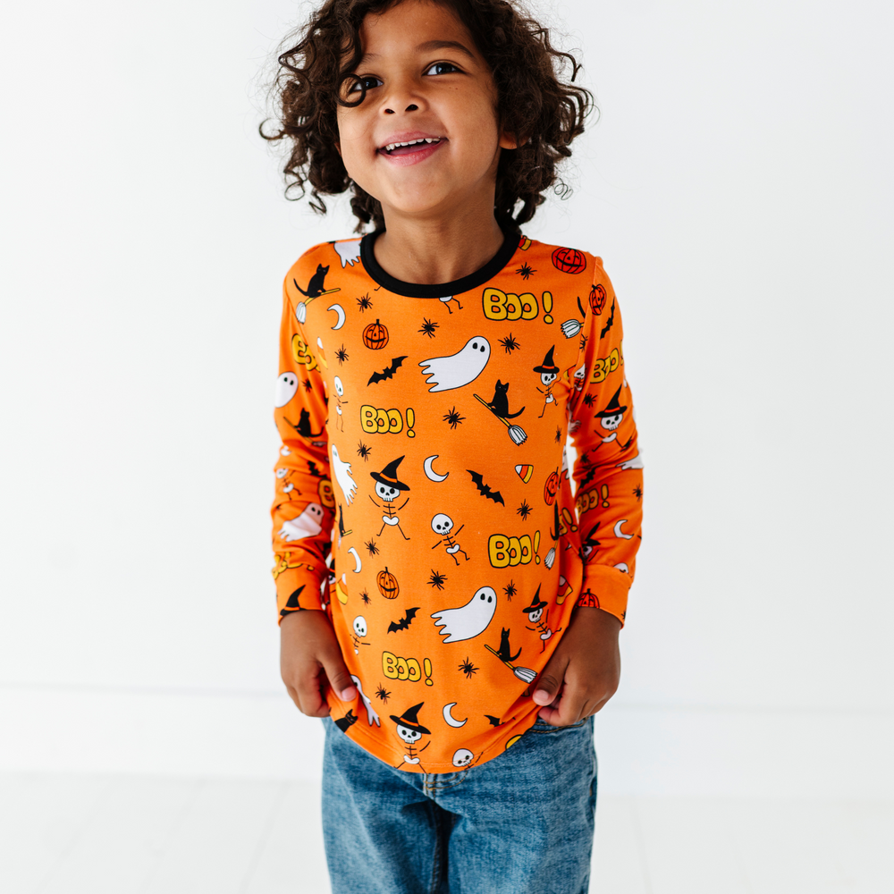 
                      
                         Boy wearing longsleeve Halloween shirt by Kiki and Lulu
                      
                    