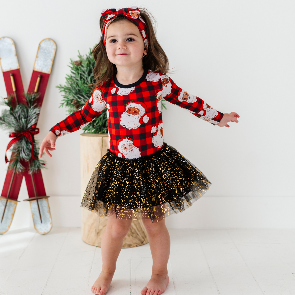 
                      
                        Girl in Christmas dress with tulle by Kiki and Lulu
                      
                    