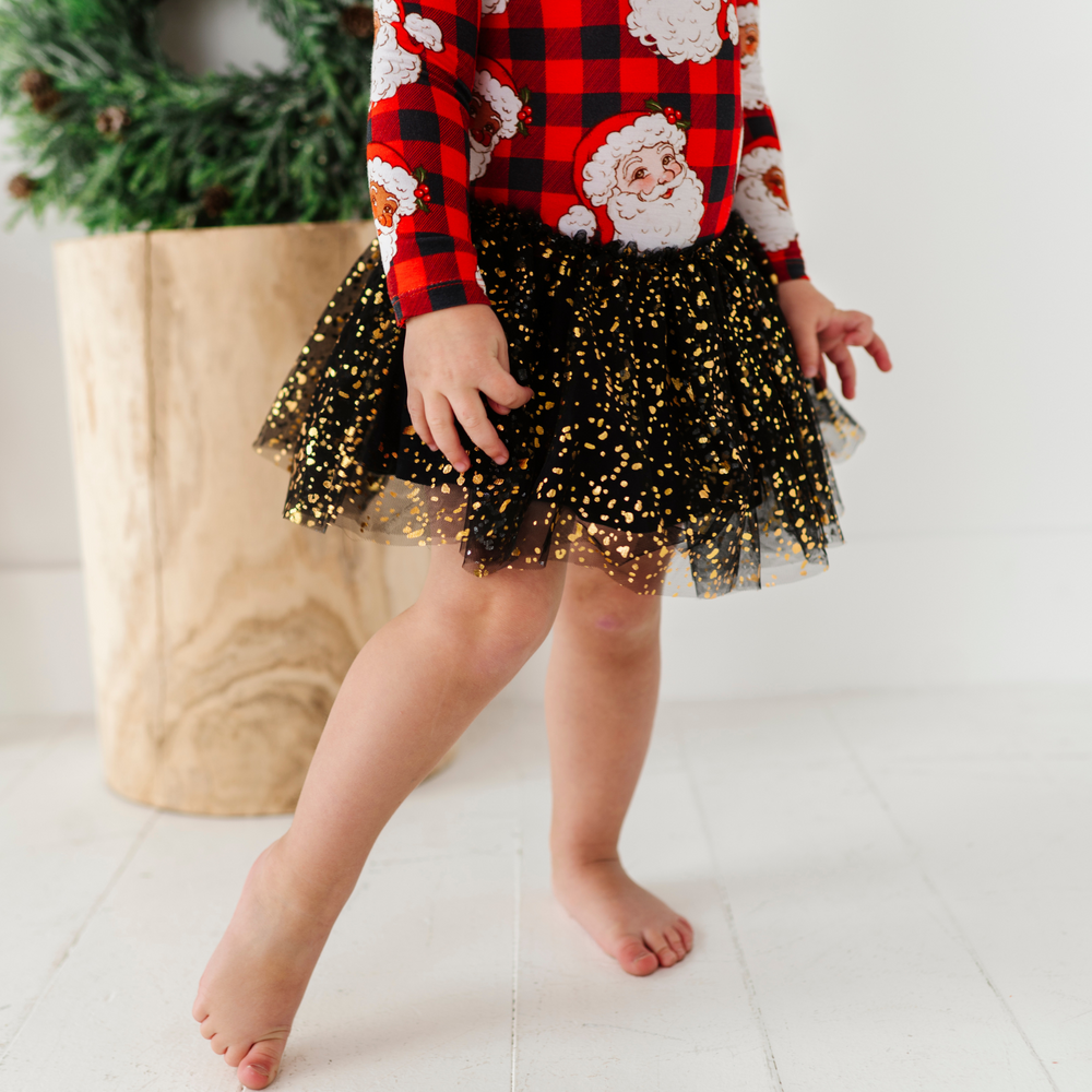 
                      
                        Girl in Christmas dress with tulle by Kiki and Lulu
                      
                    