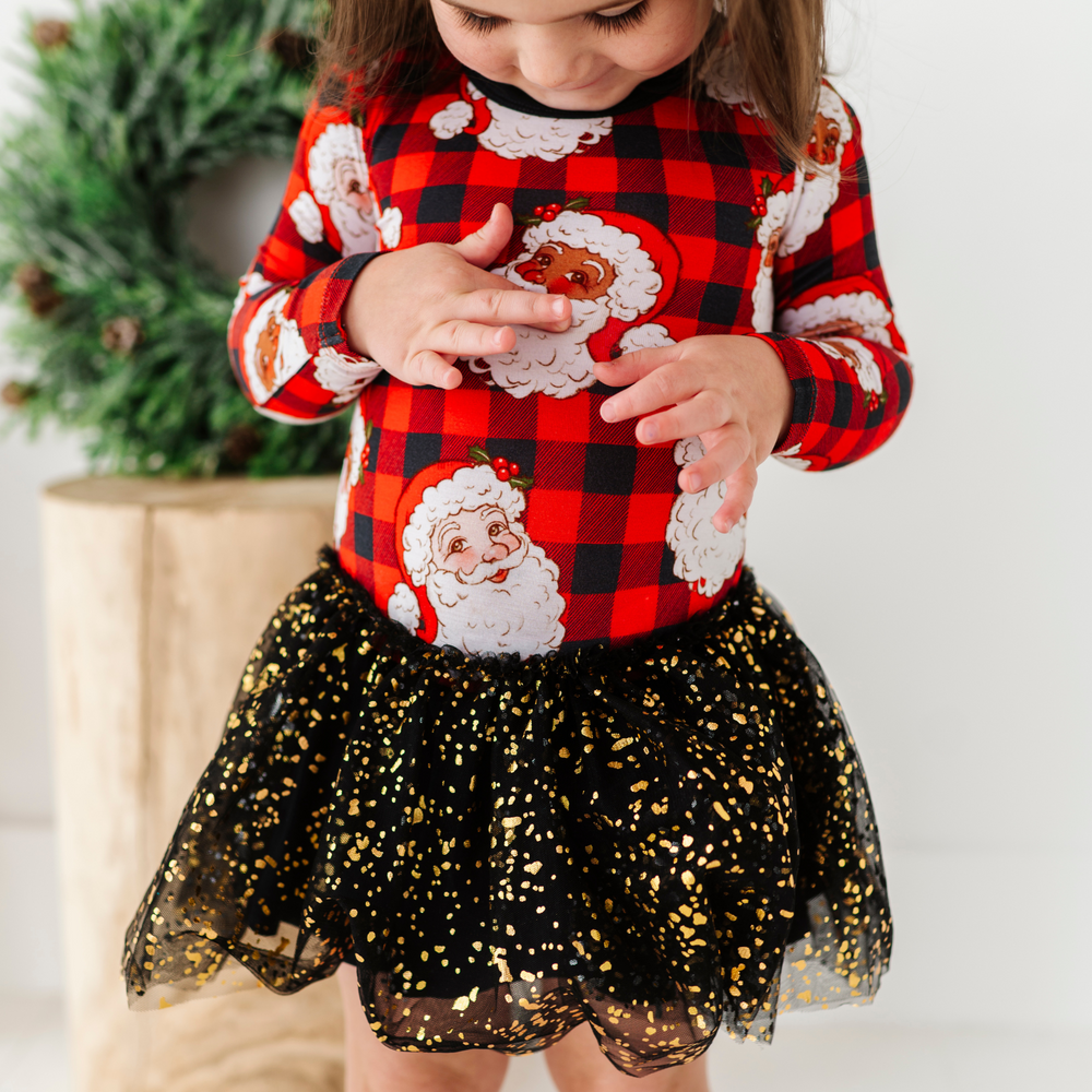 
                      
                        Girl in Christmas dress with tulle by Kiki and Lulu
                      
                    