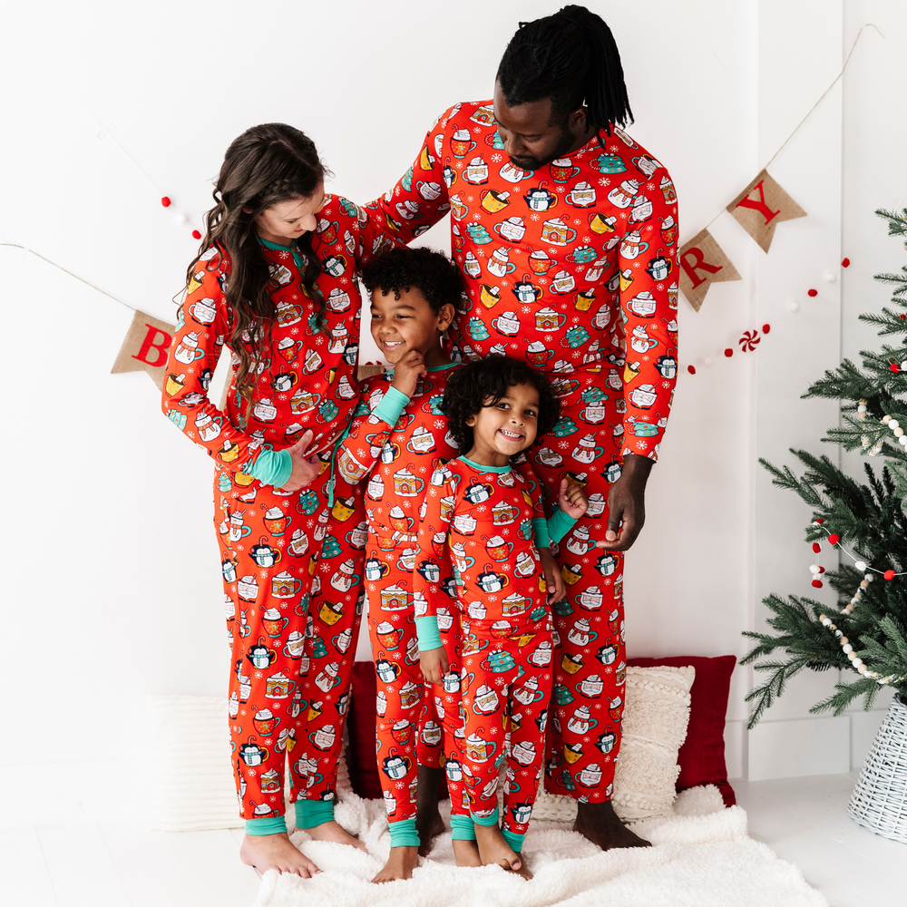 
                
                    Load image into Gallery viewer, Family in matching christmas pajamas
                
            