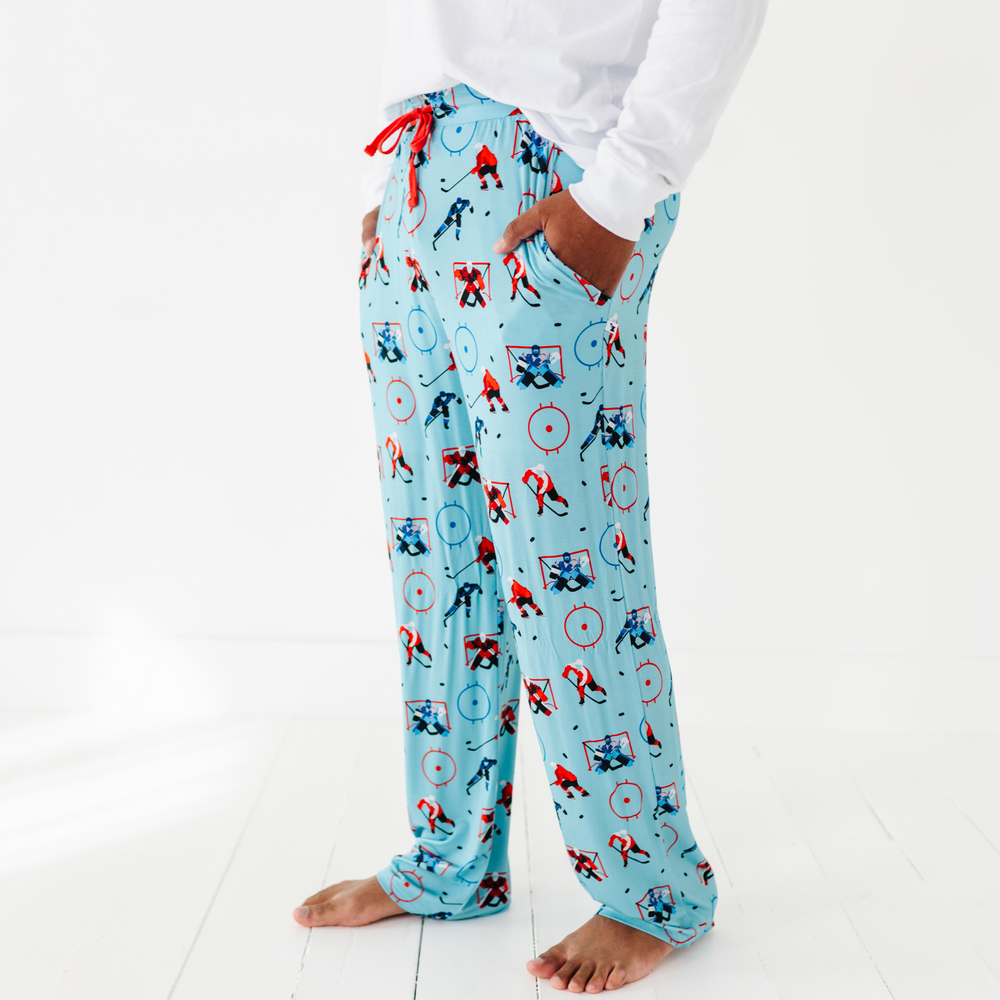 
                      
                        Man in hockey pajama pants
                      
                    