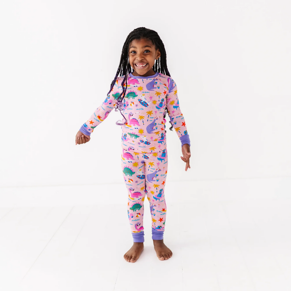 
                      
                        Pink dinosaur pajamas by Kiki and Lulu
                      
                    