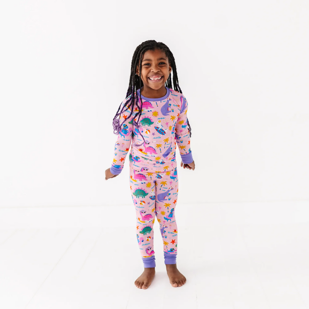 
                      
                        Pink dinosaur pajamas by Kiki and Lulu
                      
                    