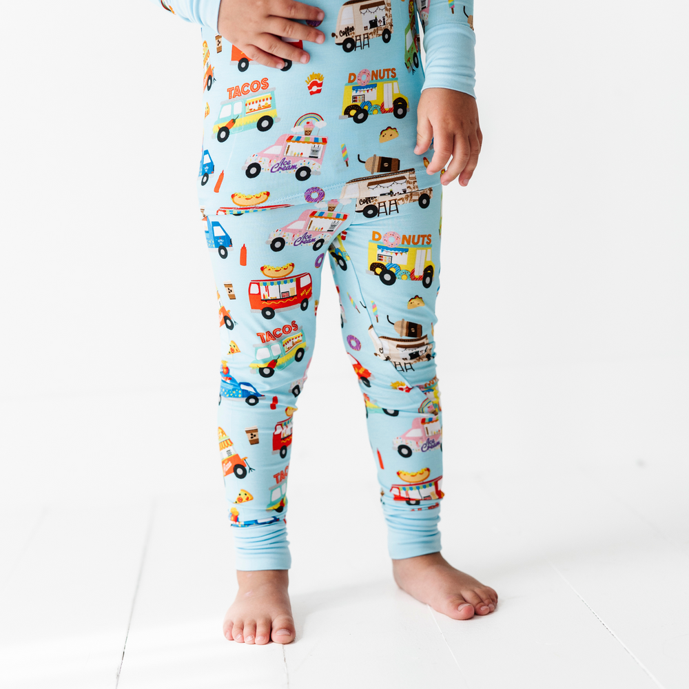 
                      
                        Kid in Kiki+Lulu Food Truck Pajamas
                      
                    