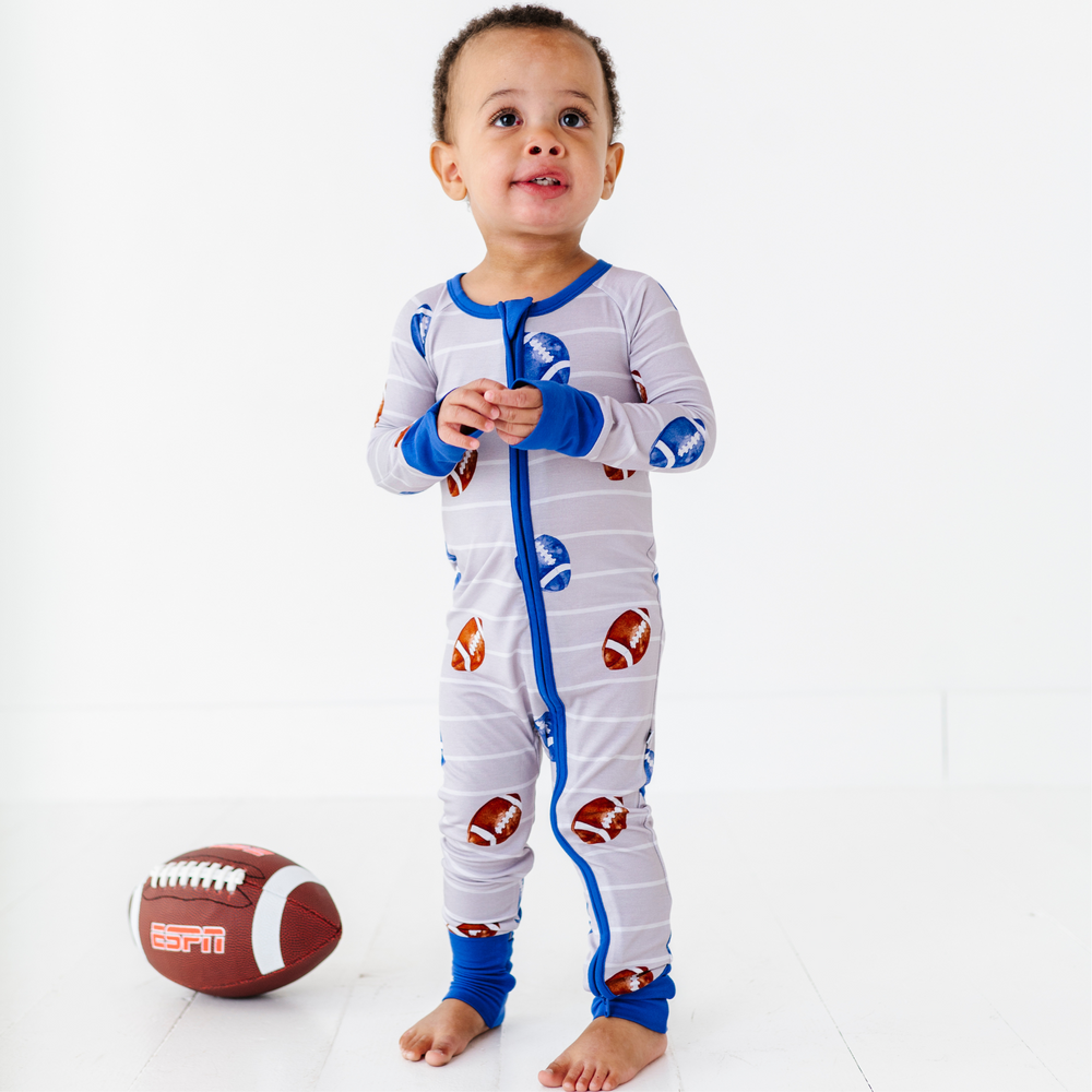 
                      
                        Boy in Football Convertible Footies by Kiki and Lulu
                      
                    