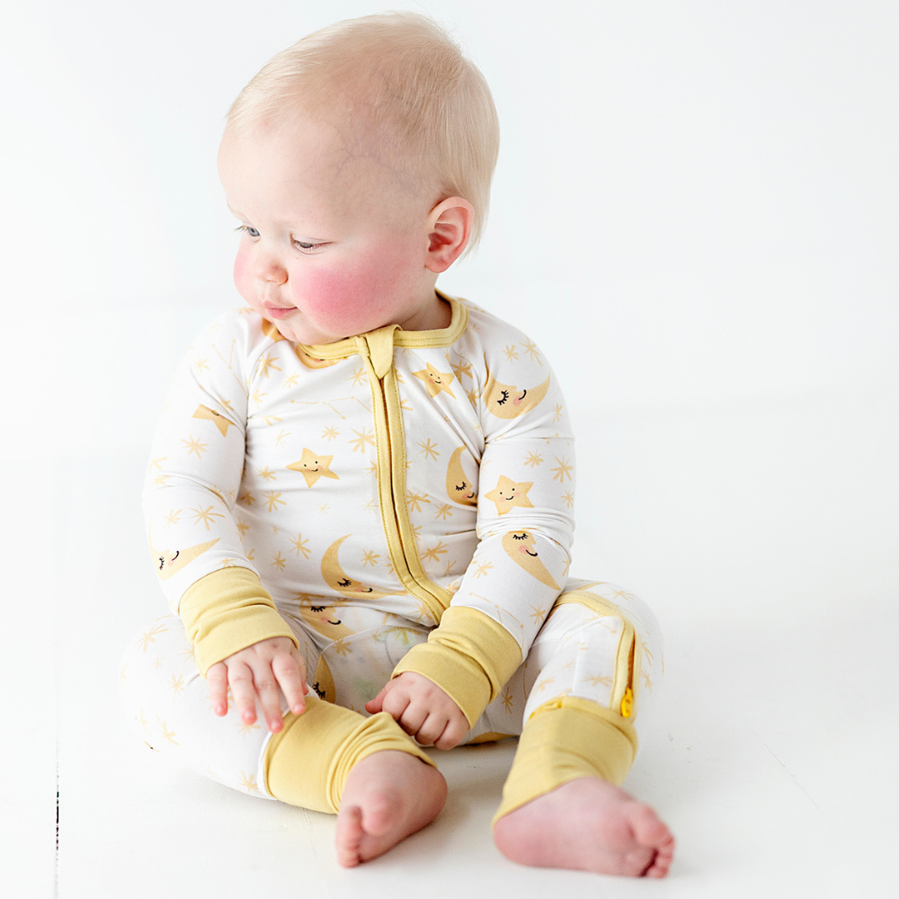 
                      
                        Baby in Kiki and Lulu Star Footies
                      
                    