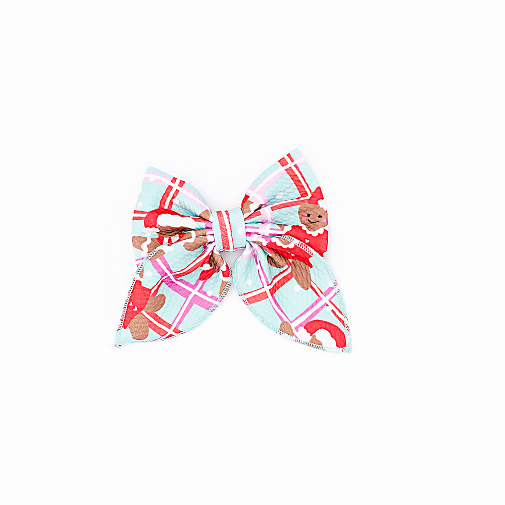 
                      
                        Girl in Gingerbread Clip Bow by Kiki and Lulu
                      
                    