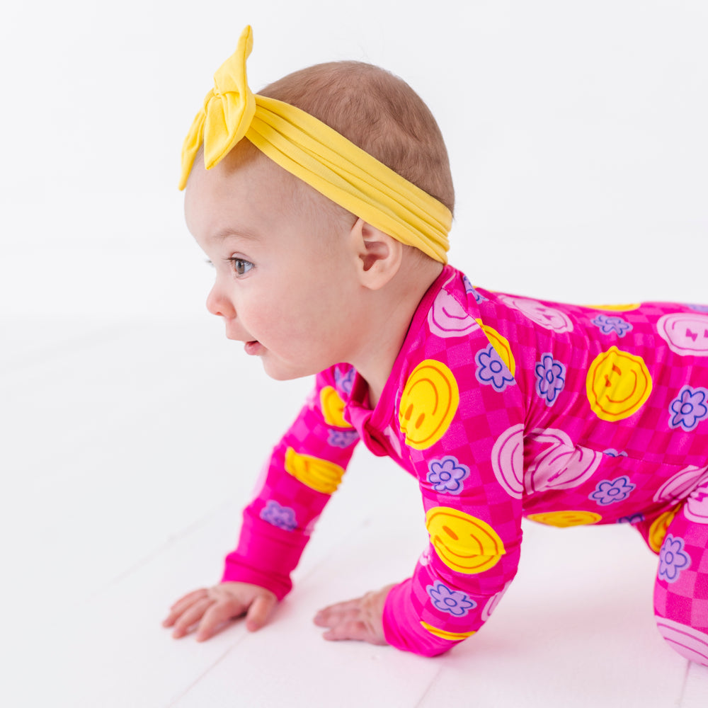 
                      
                        Girl Wearing Pink Smiley Footies by Kiki and Lulu
                      
                    