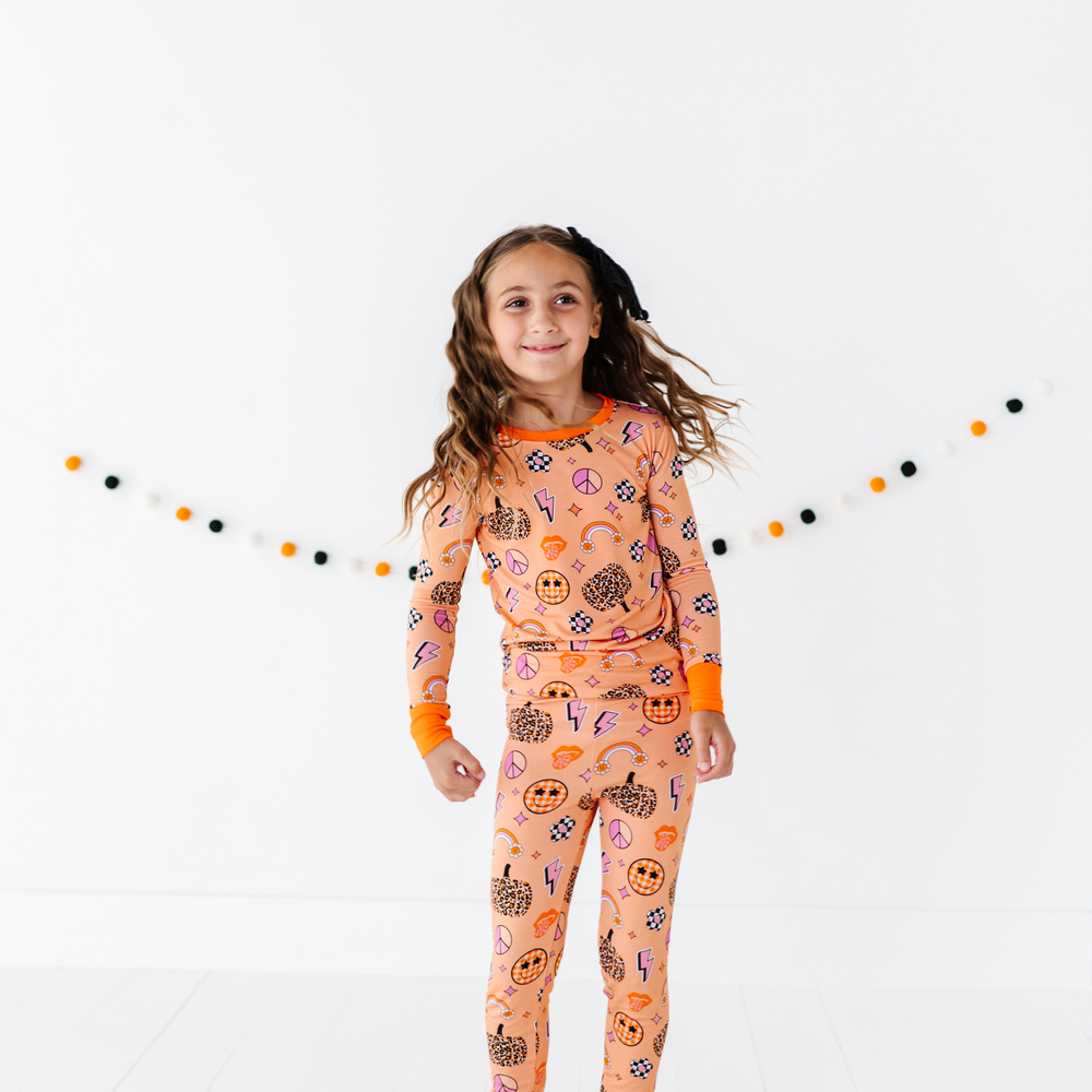 
                      
                        Girl in retro fall pajamas by Kiki and Lulu
                      
                    