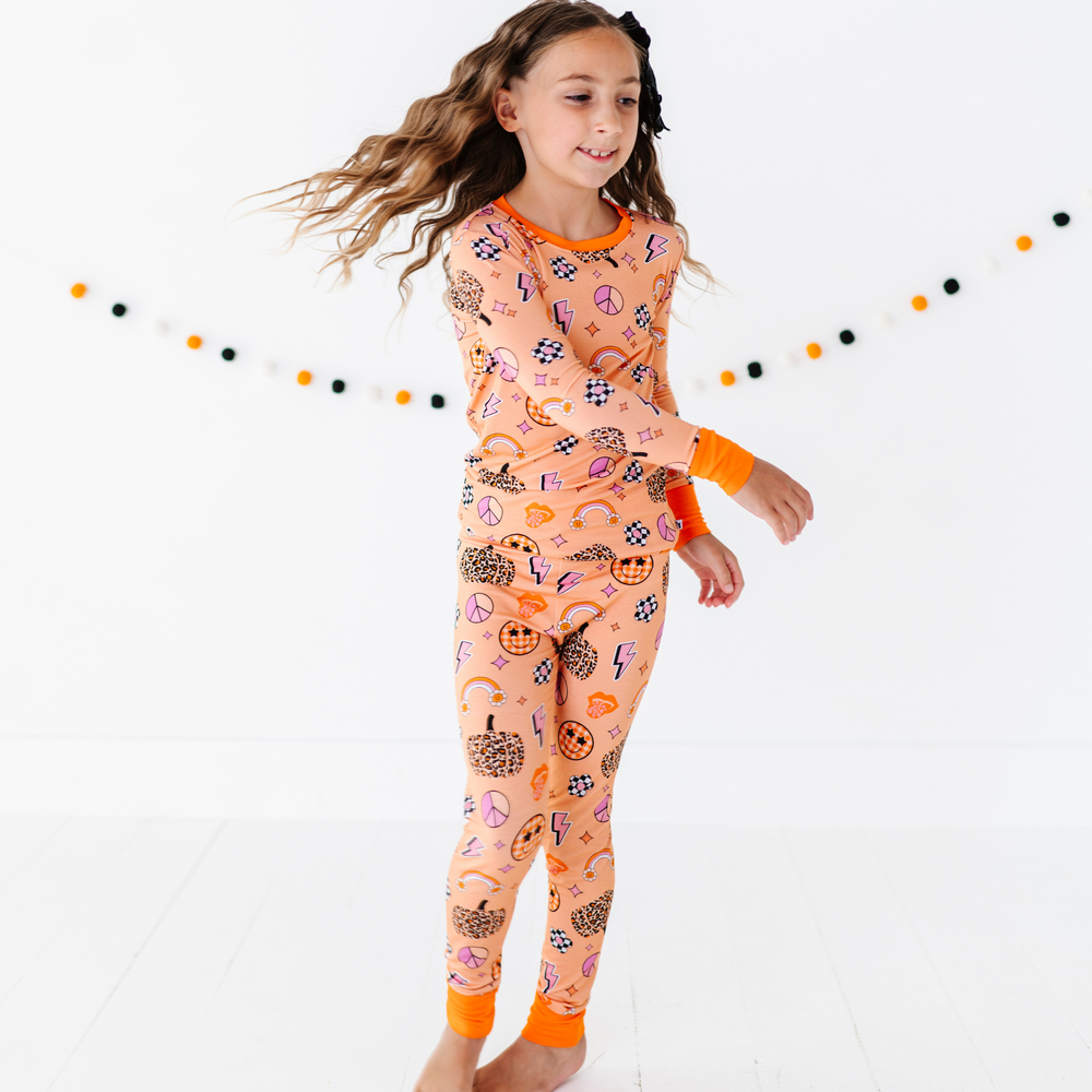 
                      
                        Girl in retro fall pajamas by Kiki and Lulu
                      
                    