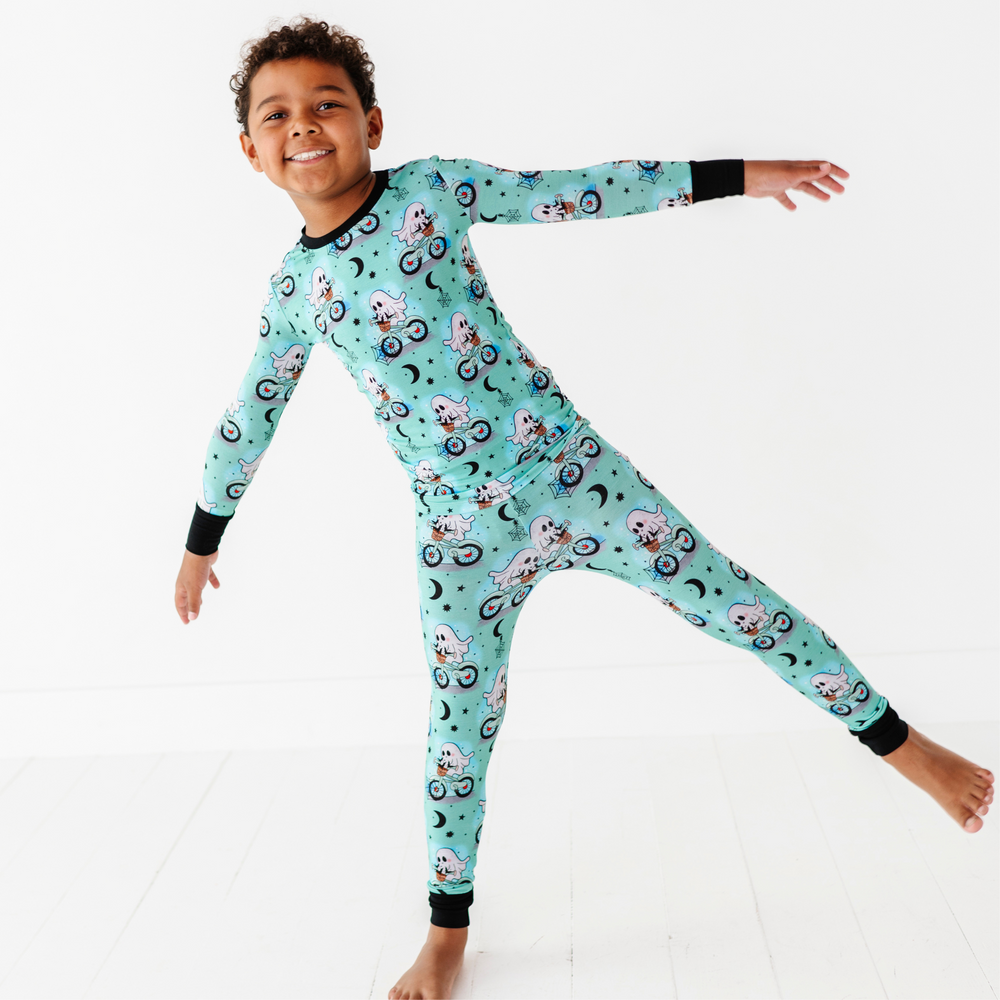 
                      
                        Boy wearing motorcycle ghost pajamas by Kiki and Lulu
                      
                    