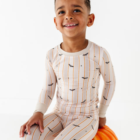 Kids Halloween PJs with bats for siblings in soft bamboo fabric