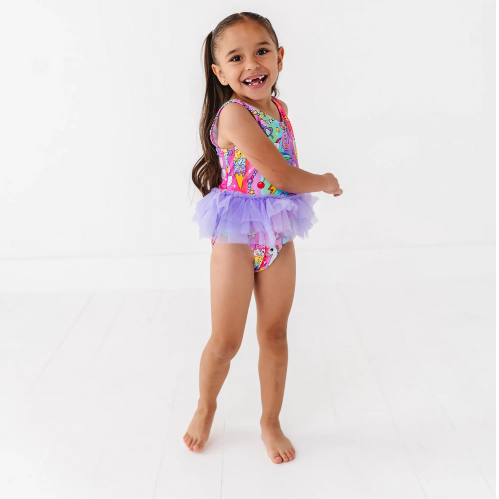 
                      
                        Cosmic Candyland Swimsuit With Tutu
                      
                    