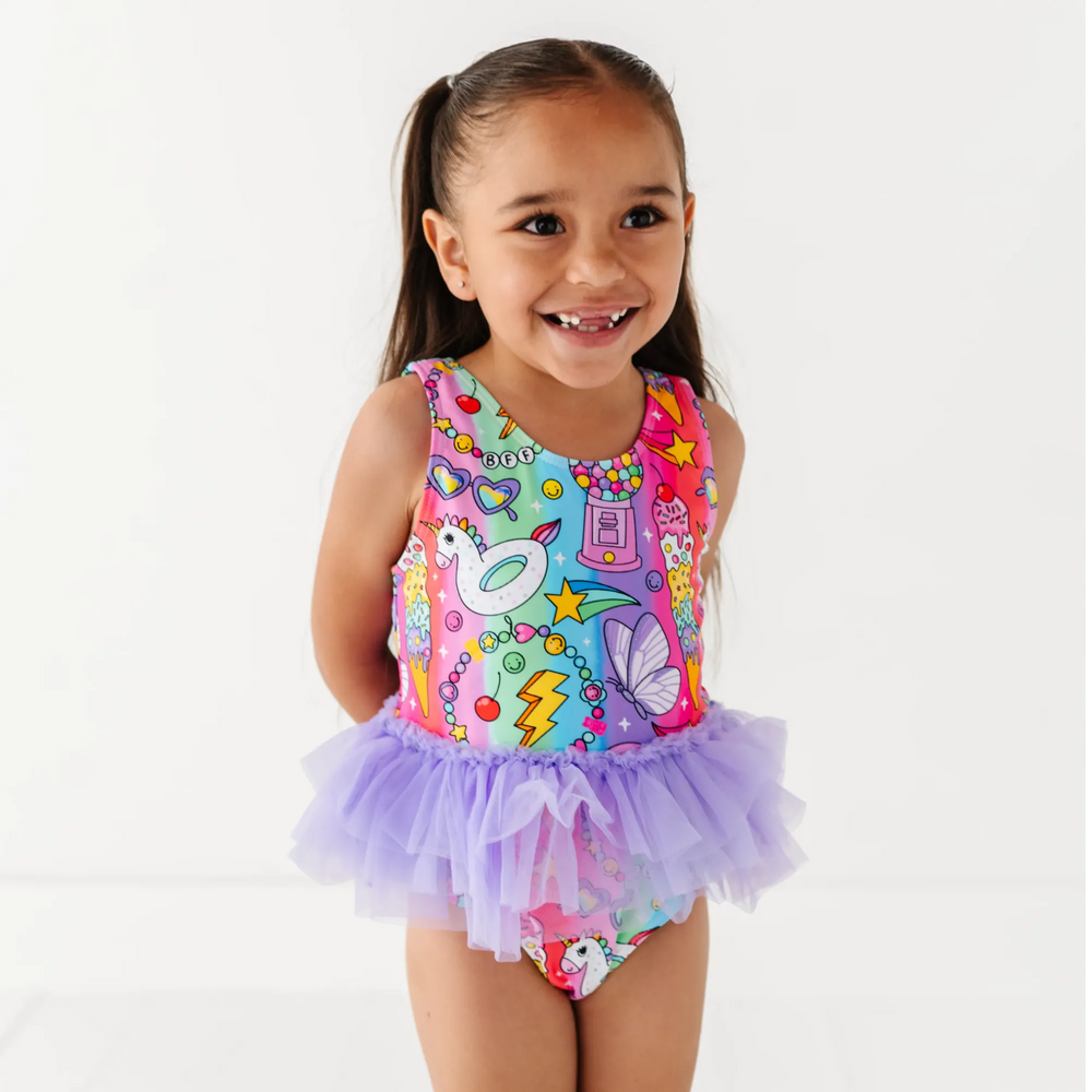 
                      
                        Cosmic Candyland Swimsuit With Tutu
                      
                    