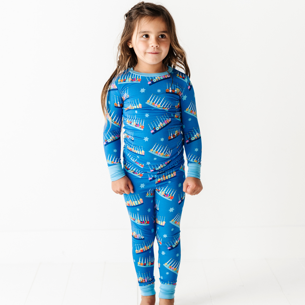 
                
                    Load image into Gallery viewer, Girl in Hanukkah Pajamas
                
            