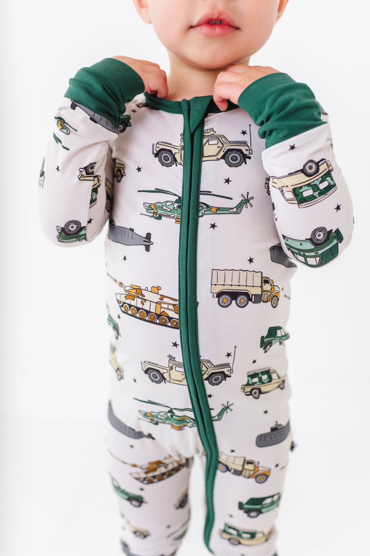 Boy in Military Vehicle Zip Pajamas