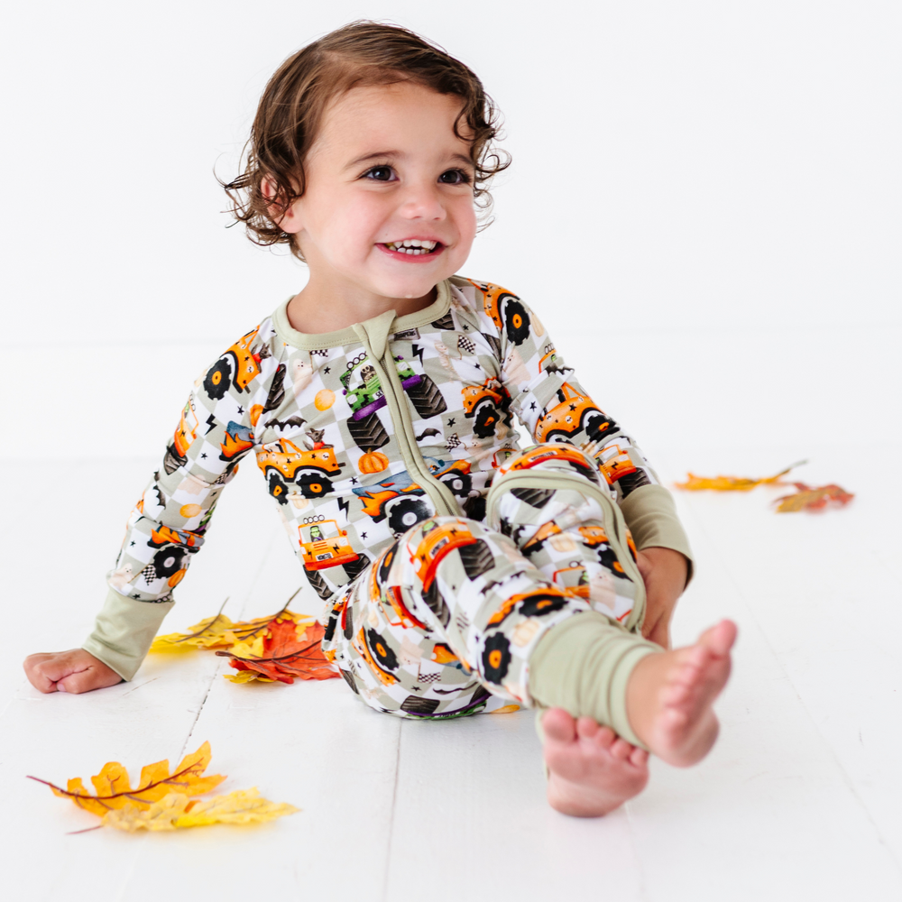 
                      
                        Boy in Halloween Monster Truck Pajamas by Kiki and Lulu
                      
                    