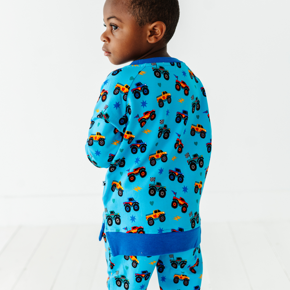 
                      
                        Kid wearing monster truck jogger set by Kiki and Lulu
                      
                    