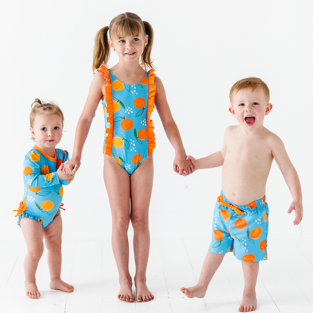 
                      
                        Be My Clementine Long Sleeve Ruffle Swimsuit
                      
                    