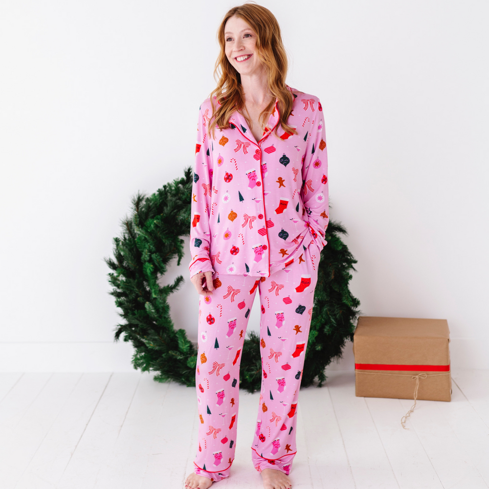 
                      
                        Woman in pink Christmas pajamas by Kiki and Lulu
                      
                    