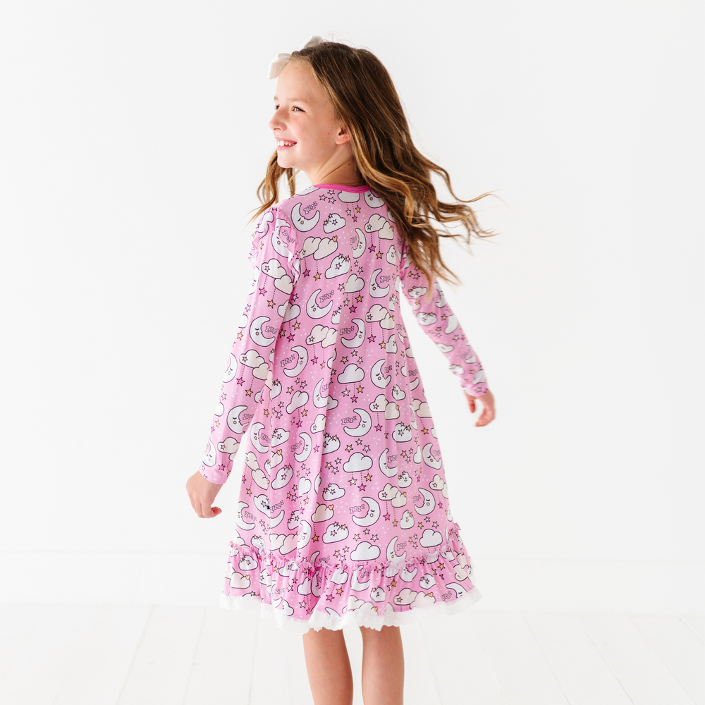 
                      
                        Girl in pink moon nightgown by Kiki and Lulu
                      
                    