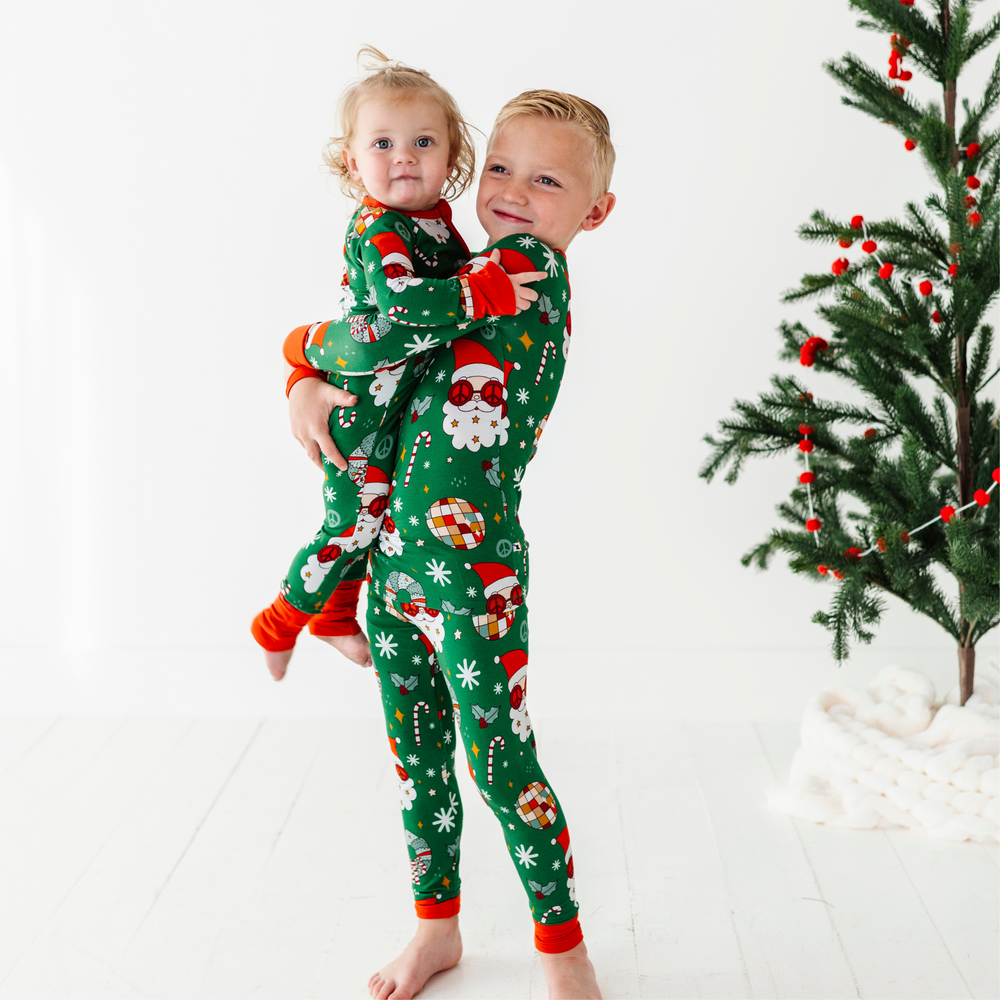 
                      
                        Siblings in retro Christmas  pajamas by Kiki and Lulu
                      
                    