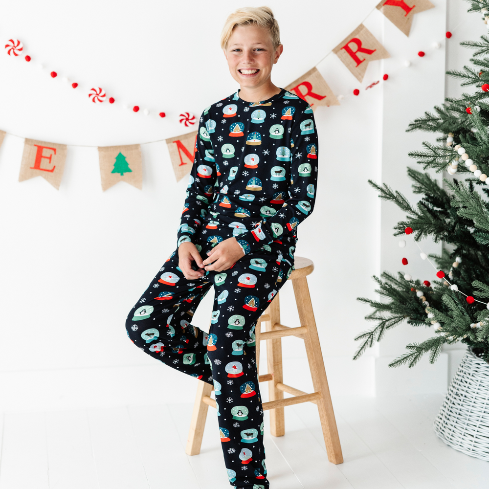 
                      
                        Boy in Kiki and Lulu Christmas Family Matching Snow Globe Pajamas
                      
                    