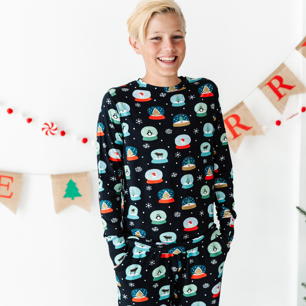 
                      
                        Boy in Kiki and Lulu Christmas Family Matching Snow Globe Pajamas
                      
                    