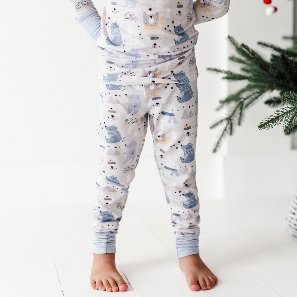 
                      
                        Kid in Winter Polar Bear Pajamas by Kiki and Lulu
                      
                    