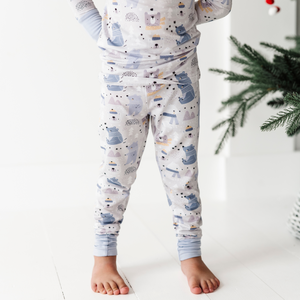 Kid in Winter Polar Bear Pajamas by Kiki and Lulu