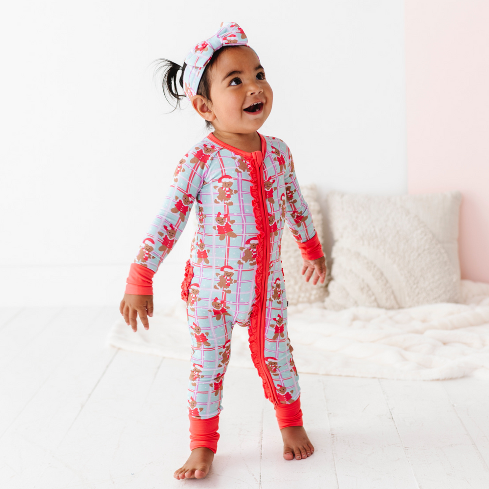 
                      
                        Girl in Gingerbread Christmas Pajamas by Kiki and Lulu
                      
                    