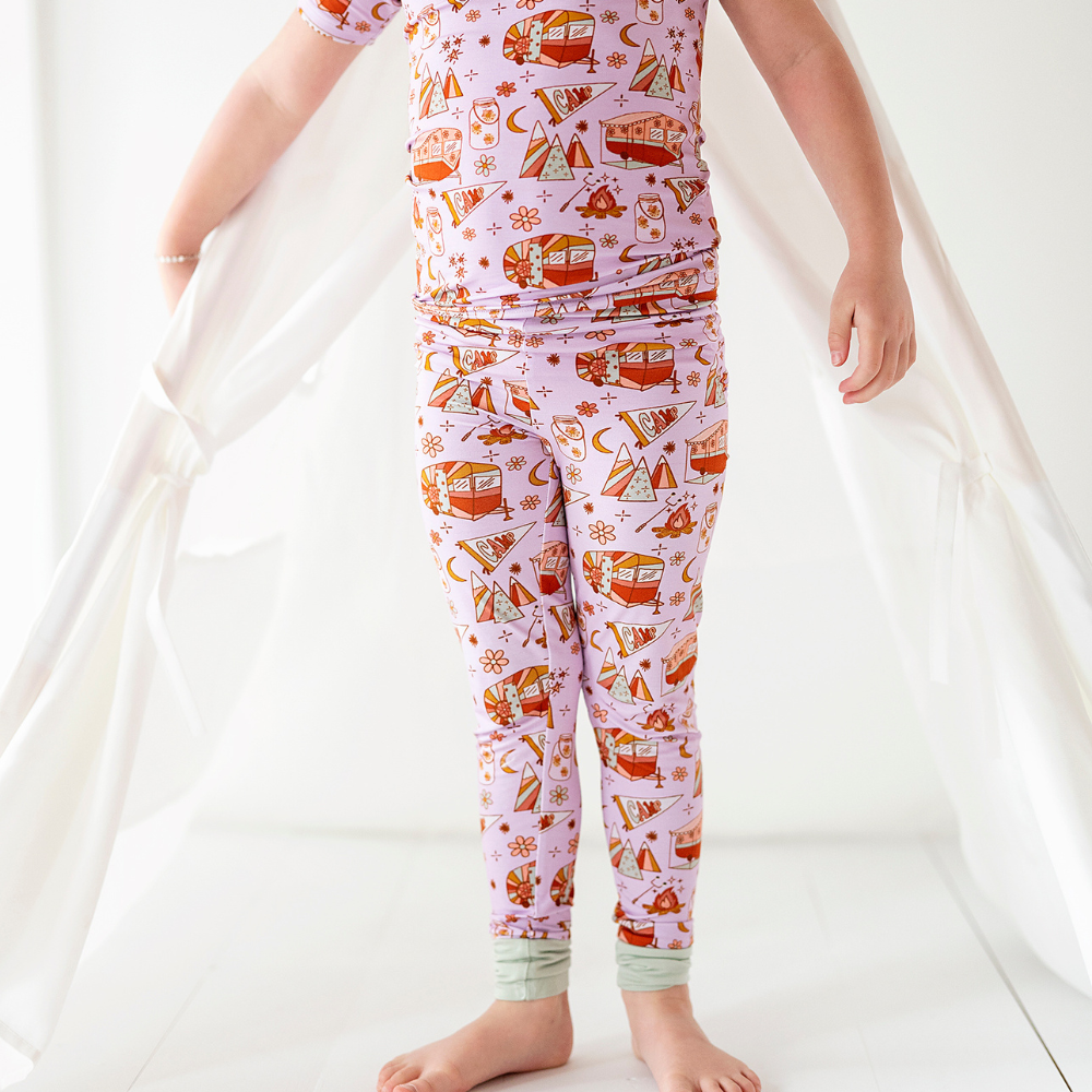 
                
                    Load image into Gallery viewer, Toddler Wearing Pajamas with Golf Print
                
            
