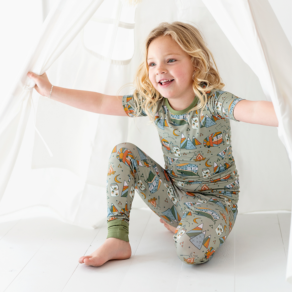 
                      
                        Toddler Wearing Pajamas with Camping Print
                      
                    