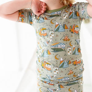 
                
                    Load image into Gallery viewer, Toddler Wearing Pajamas with Camping Print
                
            